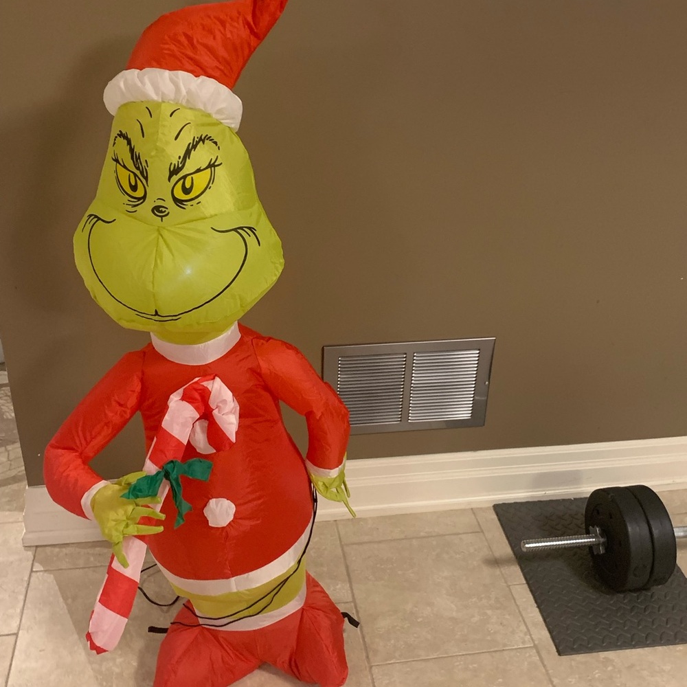 The Grinch inflatable with lights .